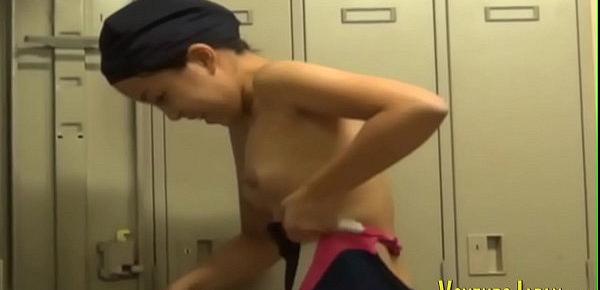  Asians in locker room change into swimsuits